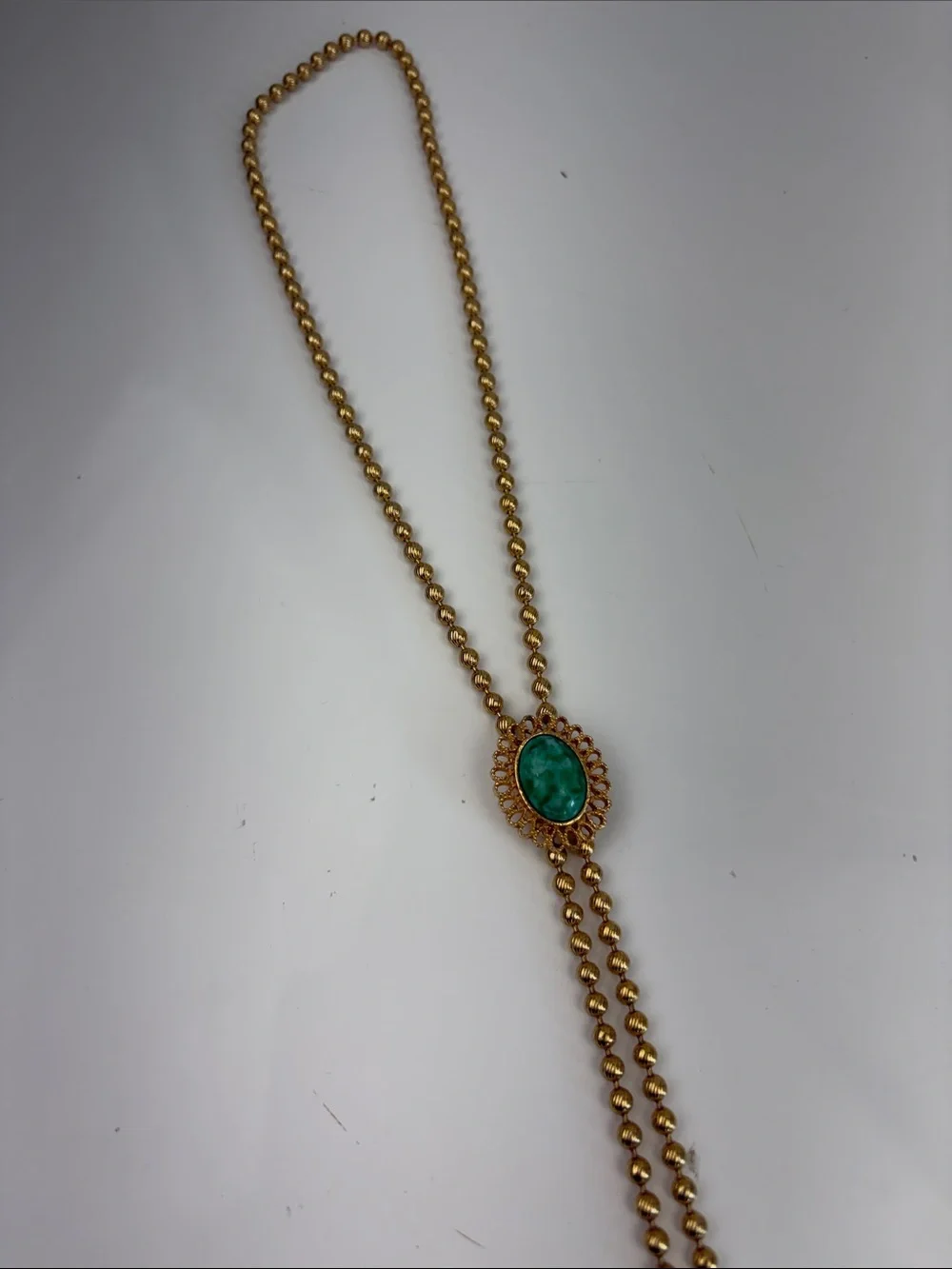 Gold Bead Lariat Necklace with Green Stone Accent